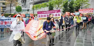 Hong Kongers hold first protest in years under strict rules