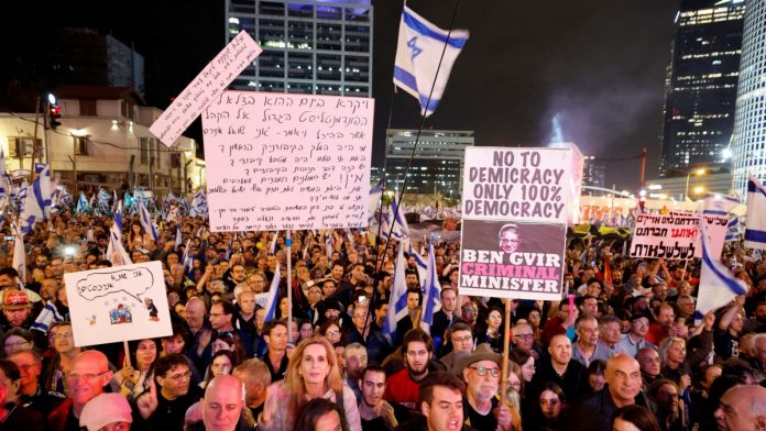 mass-protests-erupt-after-netanyahu-fires-defense-chief.jpg